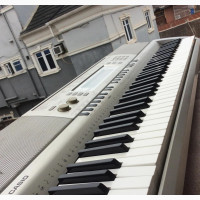 Casio WK-200 - 76 Key Portable Keyboard With Piano-Style Key