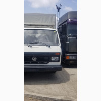 LT Pick Up With Tarpaulin