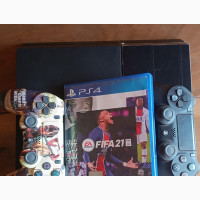 Playstation 4 With 2 Pads and 4 Games