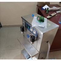 Automatic Filling Machine with Two Nozzles - Efficient and Durable