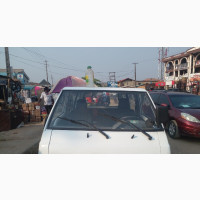 Mitsubishi L300 2002 White - Buy and Zoom in Style