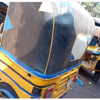 Bajaj RE 2017 Yellow Tricycle
