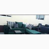 A 6 Seater Sofa With Center Puff