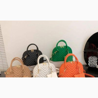 Crossed Hand Bags