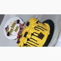 Golden Yellow With Chocolate Toppings Birthday Cakes