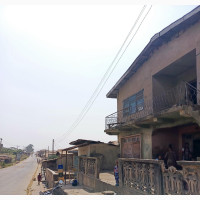 A 18 Room Story Building on 2plot, 1200 Square Meter