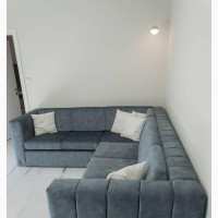 L- Shaped Sofa Made With Fabrics