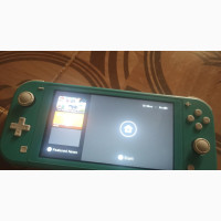 Clean Mint Nintendo Switch Lite With FIFA 23 Downloaded