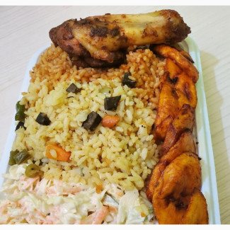 Delicious Jollof Rice with Chicken Lap and Salad