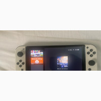 Nintendo Switch OLED + 2 Games