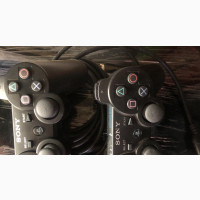 Playstation 3 with 2 Controllers and 7 Games