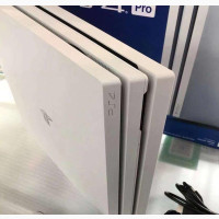 Uk Used White Ps4 Pro With a Pad and Games