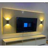 Glossy TV Stand with LED Light and Wall Cladding by Home Interiors