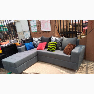 L- Shaped Fabric Sofa With Throw Pillows