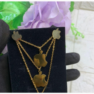 Three Layered Necklace With a Pair of Earrings