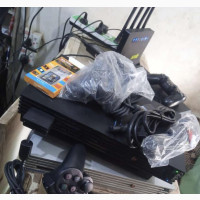 Ps2 With 2 Pads and 10 Games Installed