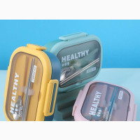 2 Compartment. Comes With Stainless Spoon and Chop Sticks