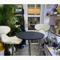 Two Bar Chairs and a Table