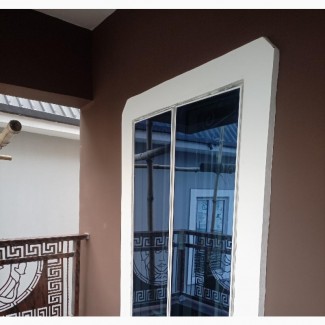 Tower Frameless Window
