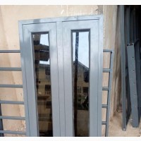 Gray Casement Window With Burglary and Net