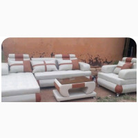 L- Shaped Leather Sofa With a Single Center Table