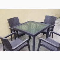 Outdoor Rattan Table and Plastic Chairs