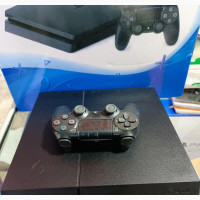 PS4 with 2 controllers and games for sale