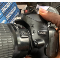 Nikon D5100 With 18-55mm Lens, Battery and Charger