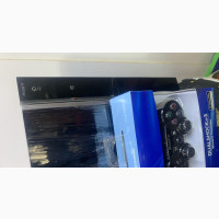 PS3 Fat Console with 6 Games and 1 Controller