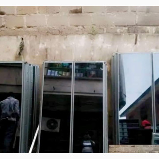 Frameless Transome Window