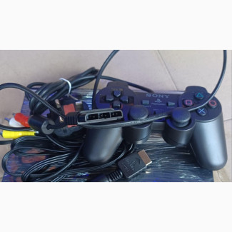 Sony Playstation 2 Slim With Pad and Games
