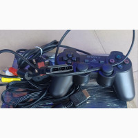 Sony Playstation 2 Slim With Pad and Games