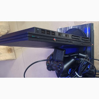 Sony Playstation 2 Slim With Pad and Games