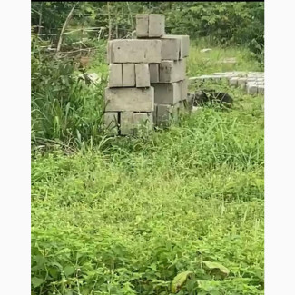 Land With Foundation and Freshly Molded Blocks for Sale