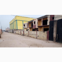 Six Flats on a 2 Plots of Land