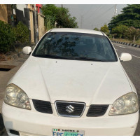 Suzuki Forenza 2010 White - Fuel Efficient Ride