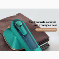 Hand-Held Ironing Machine