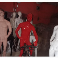 Red Fibre Sitting Man on a Bicycle