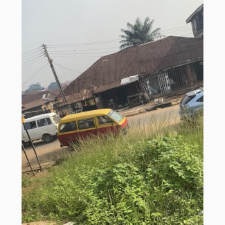 Empty Plot of Land on a Busy Road - Perfect for Any Business