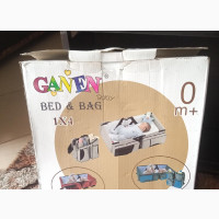 A Baby Bag And Bed