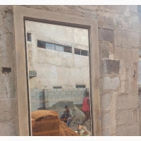 Cream Frameless Window With Burglary