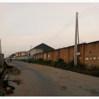 Mixed-Use Land with CofO on Tarred Road