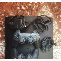 Playstation 3 Slim With Two Pads and 9 Games (PS3)